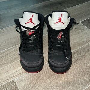 Jordan 4s youth size 6.5Y black red